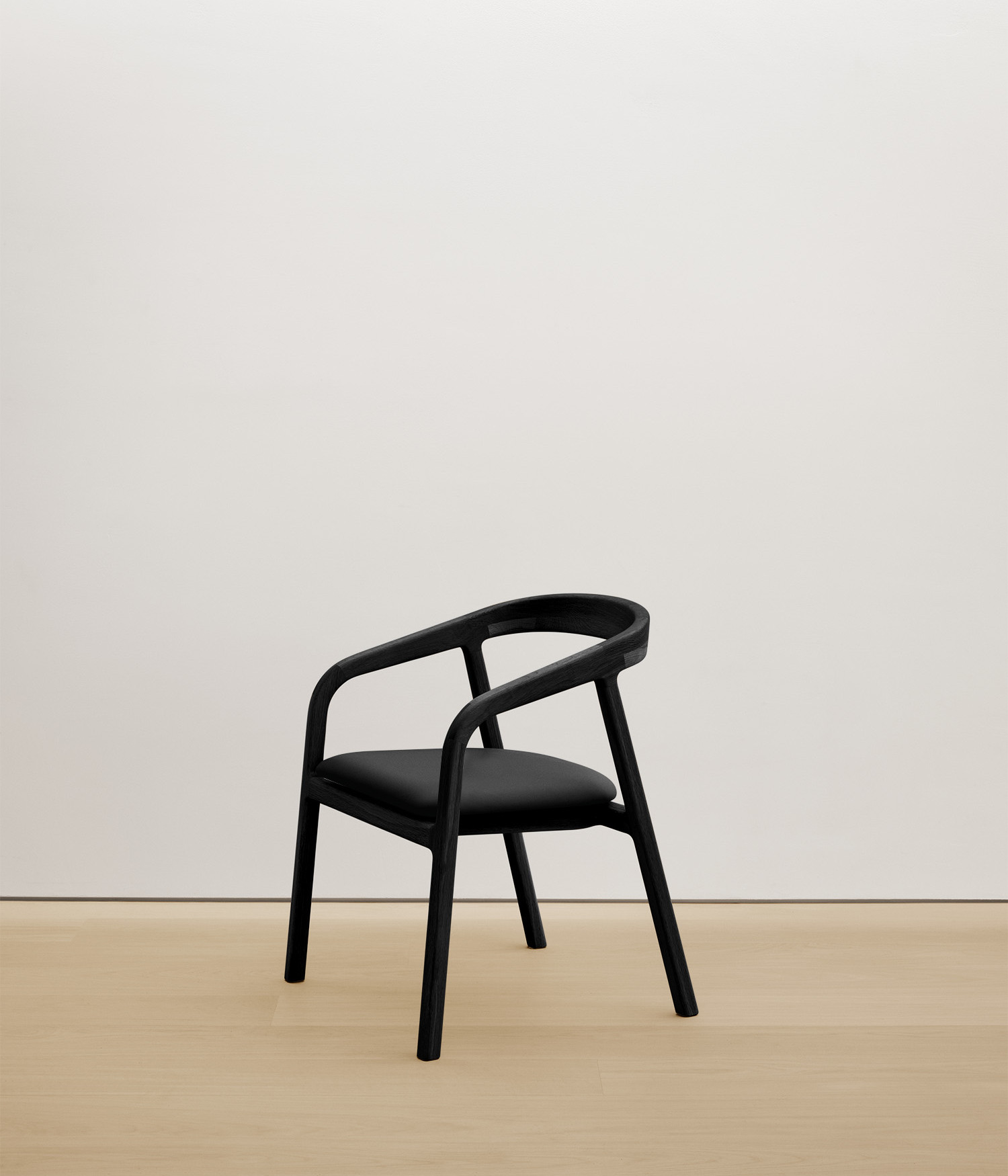  black-stained-oak chair with black color upholstered seat