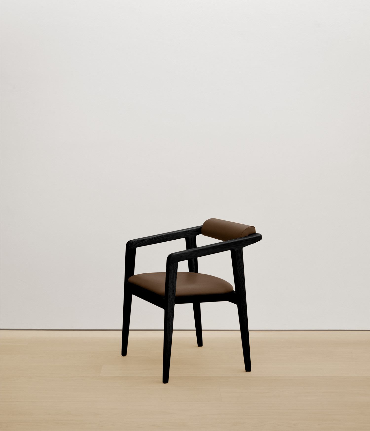  black-stained-oak chair with umber color upholstered seat