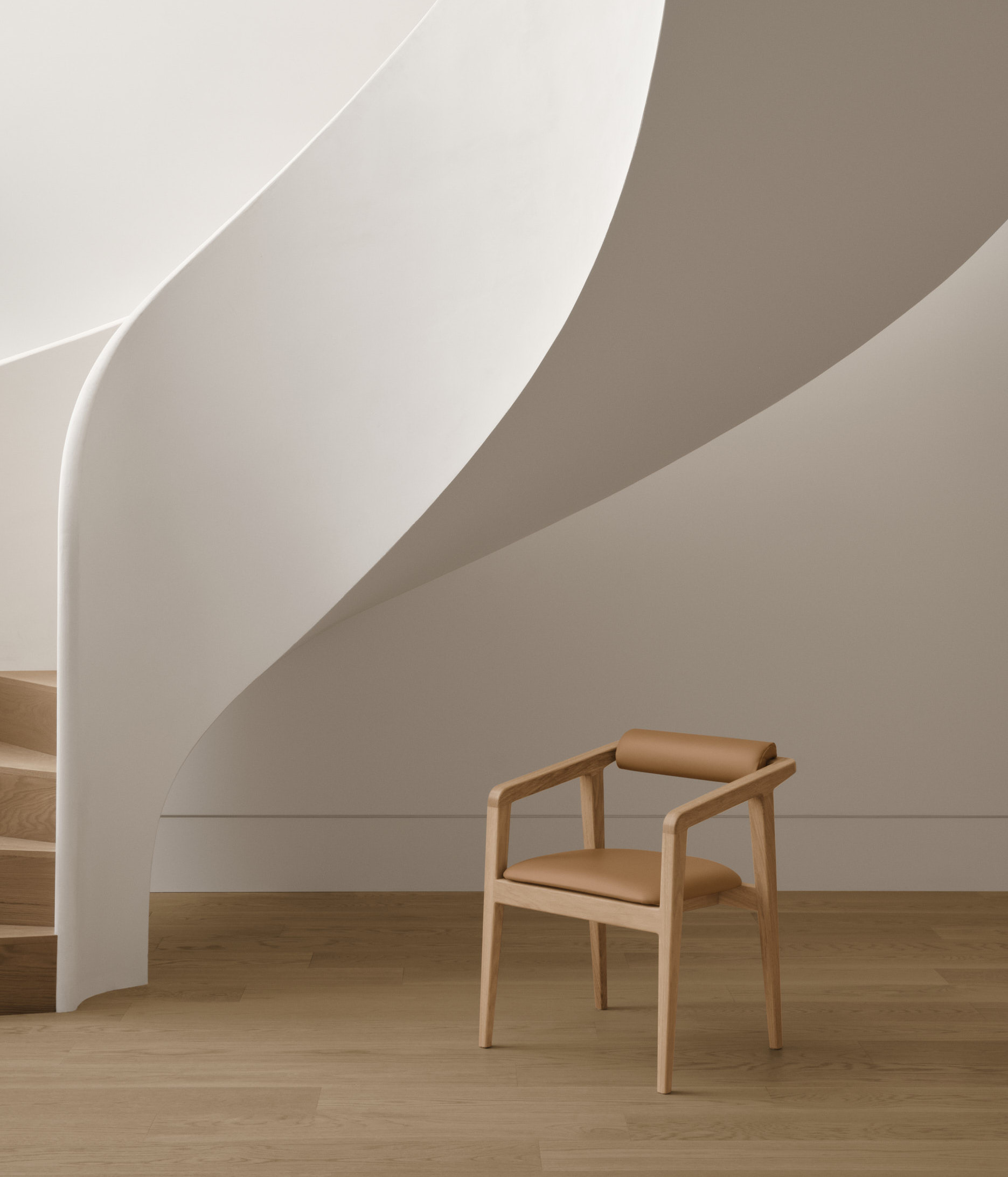 Nord Chair under a spiral stair case