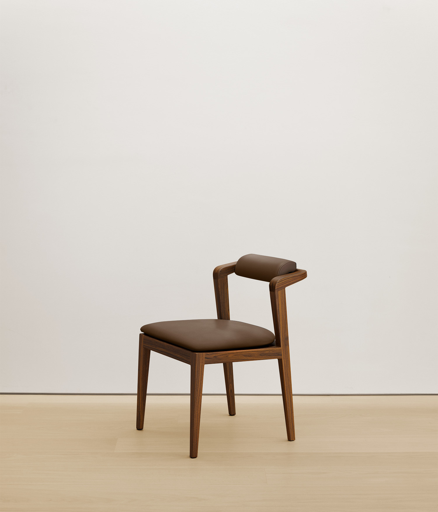  walnut chair with umber color upholstered seat