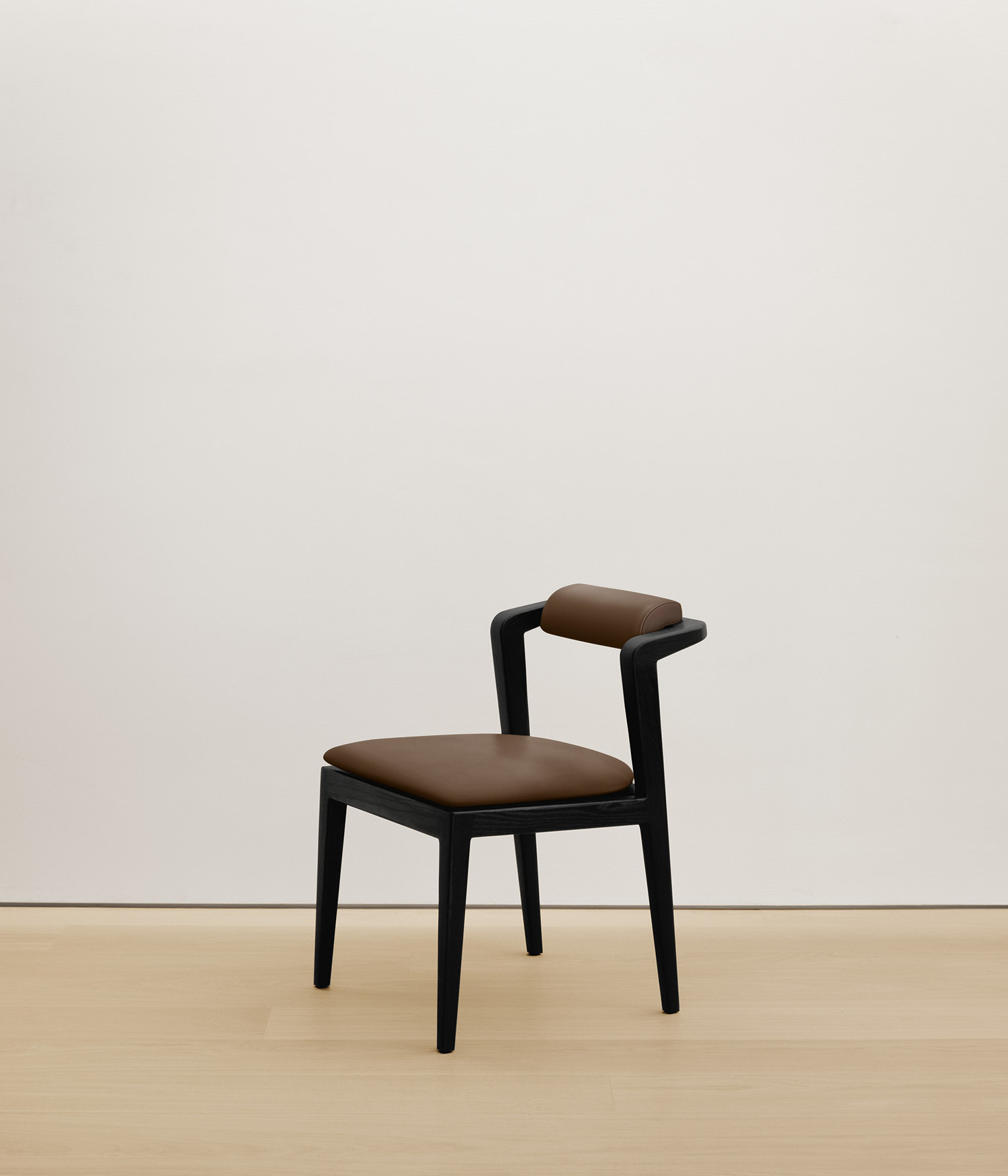  black-stained-oak chair with umber color upholstered seat