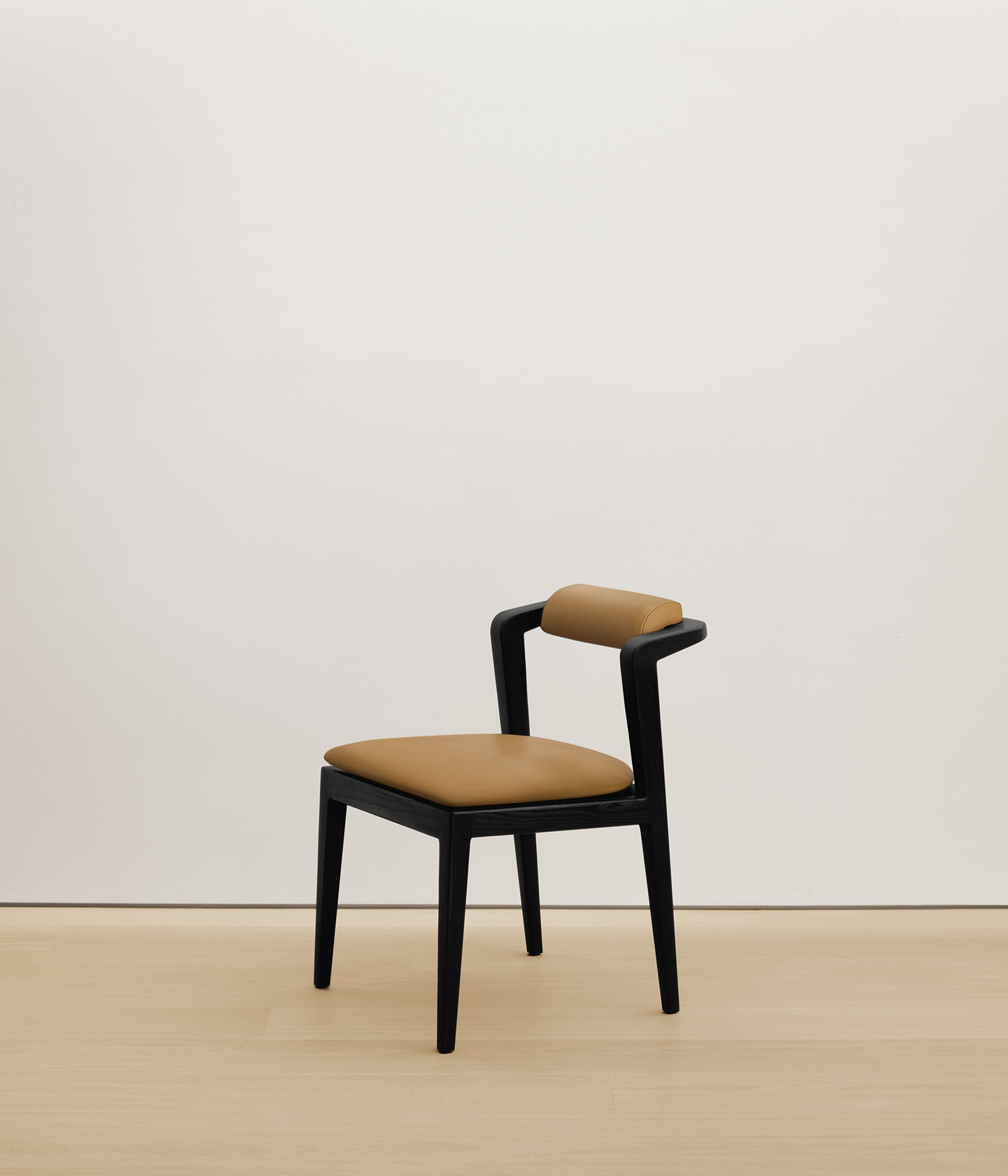  black-stained-oak chair with tan color upholstered seat 