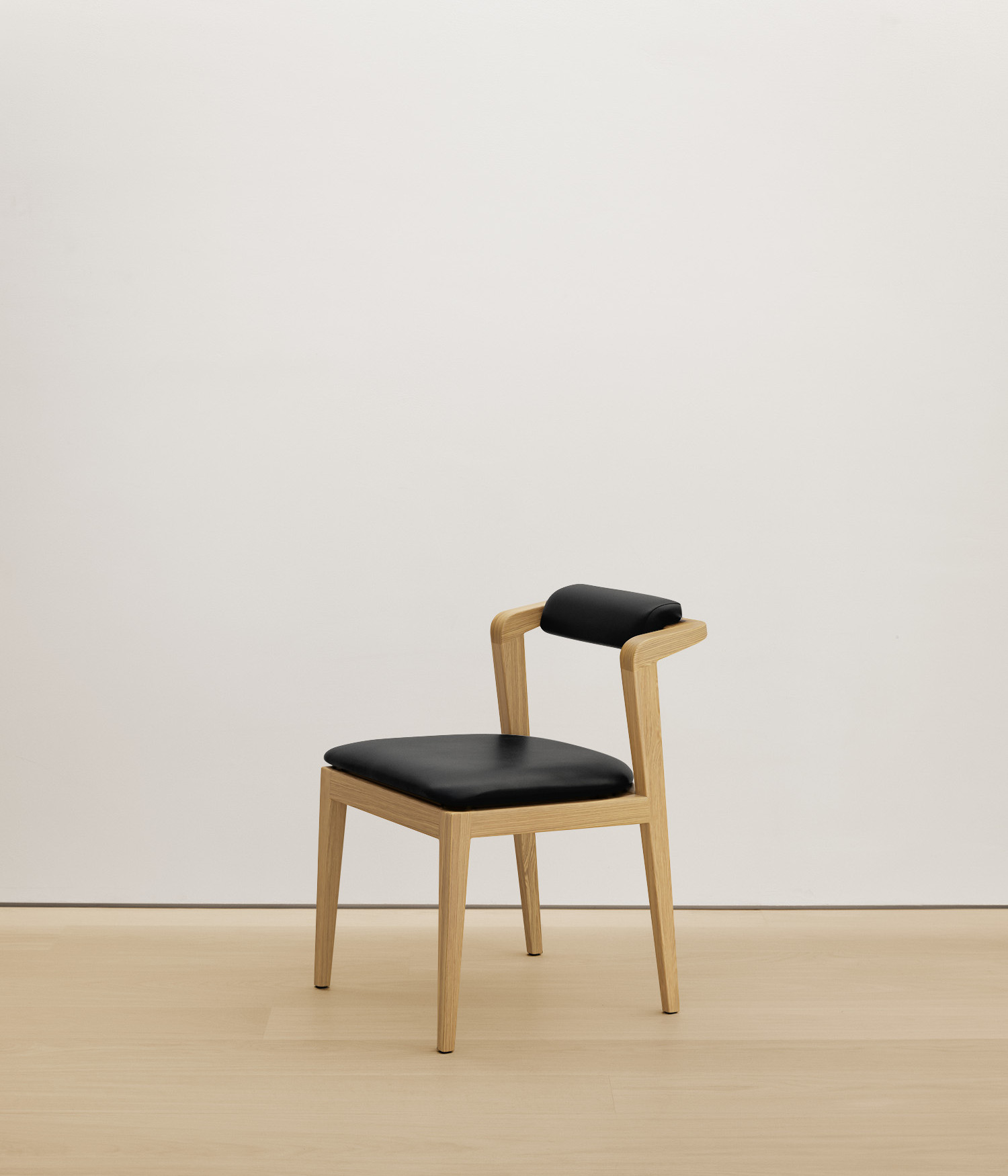  white-oak chair with black color upholstered seat