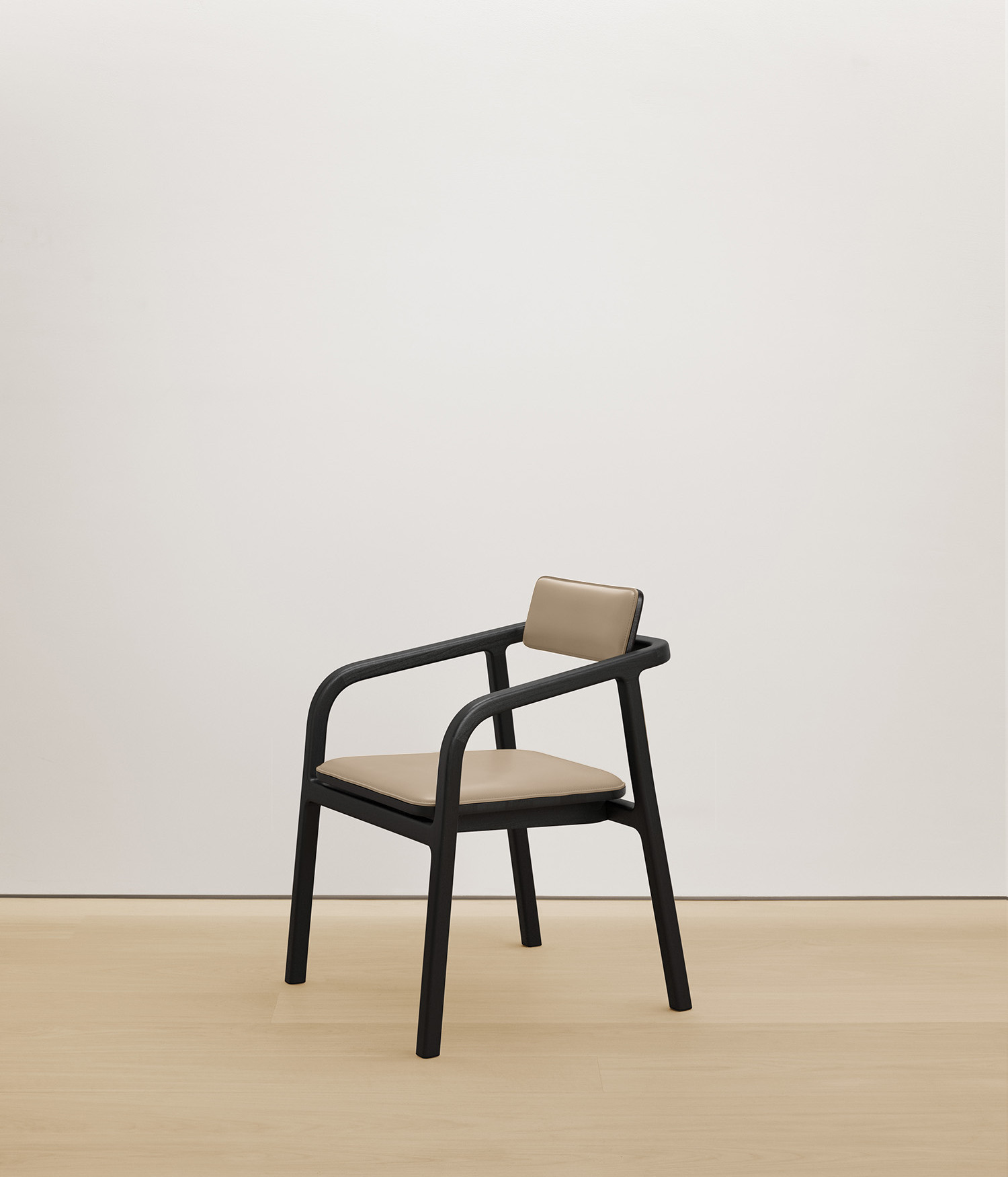  black-stained-oak chair with cream color upholstered seat 