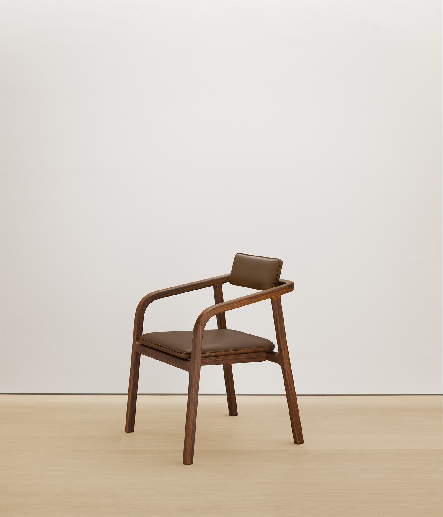  walnut chair with umber color upholstered seat