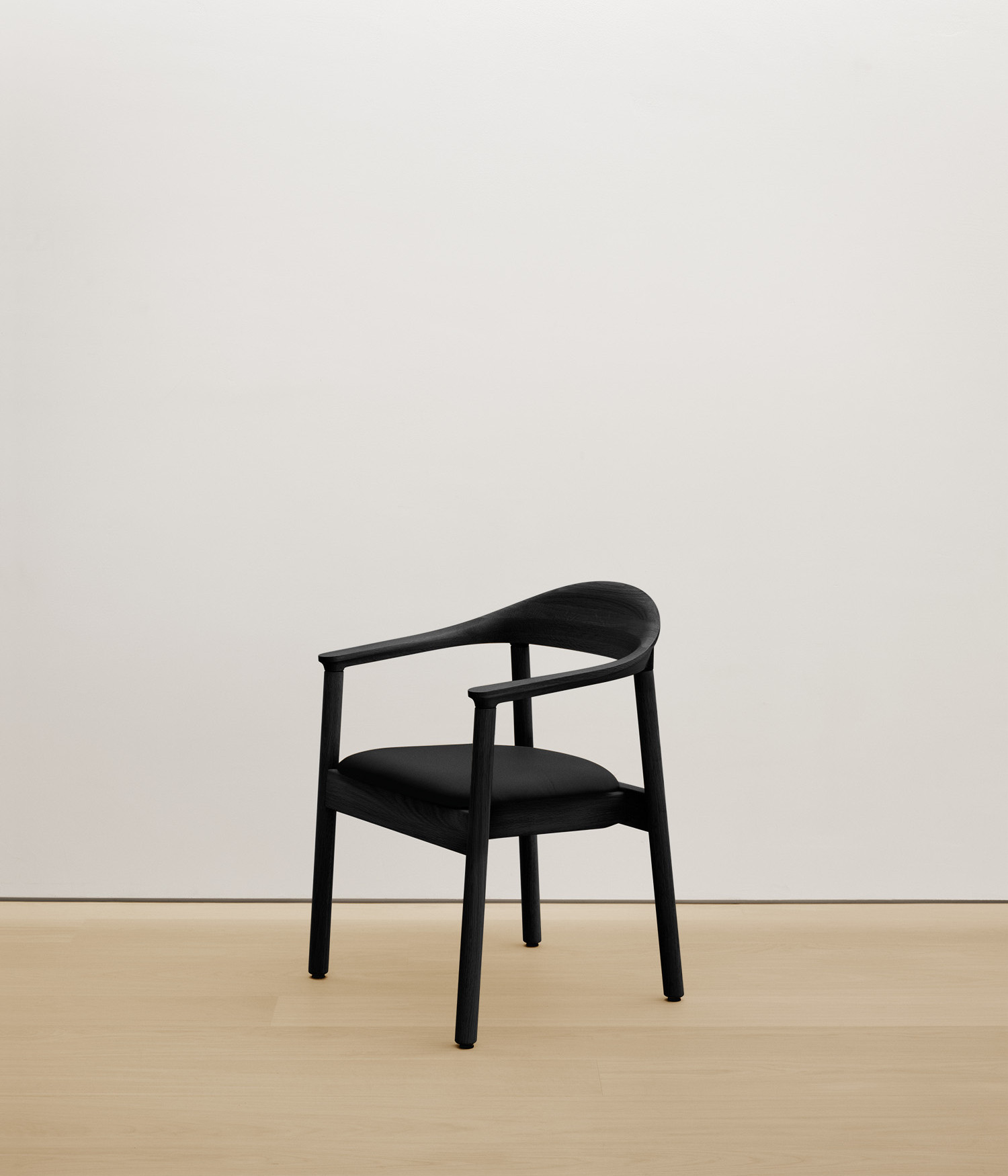  black-stained-oak chair with black color upholstered seat