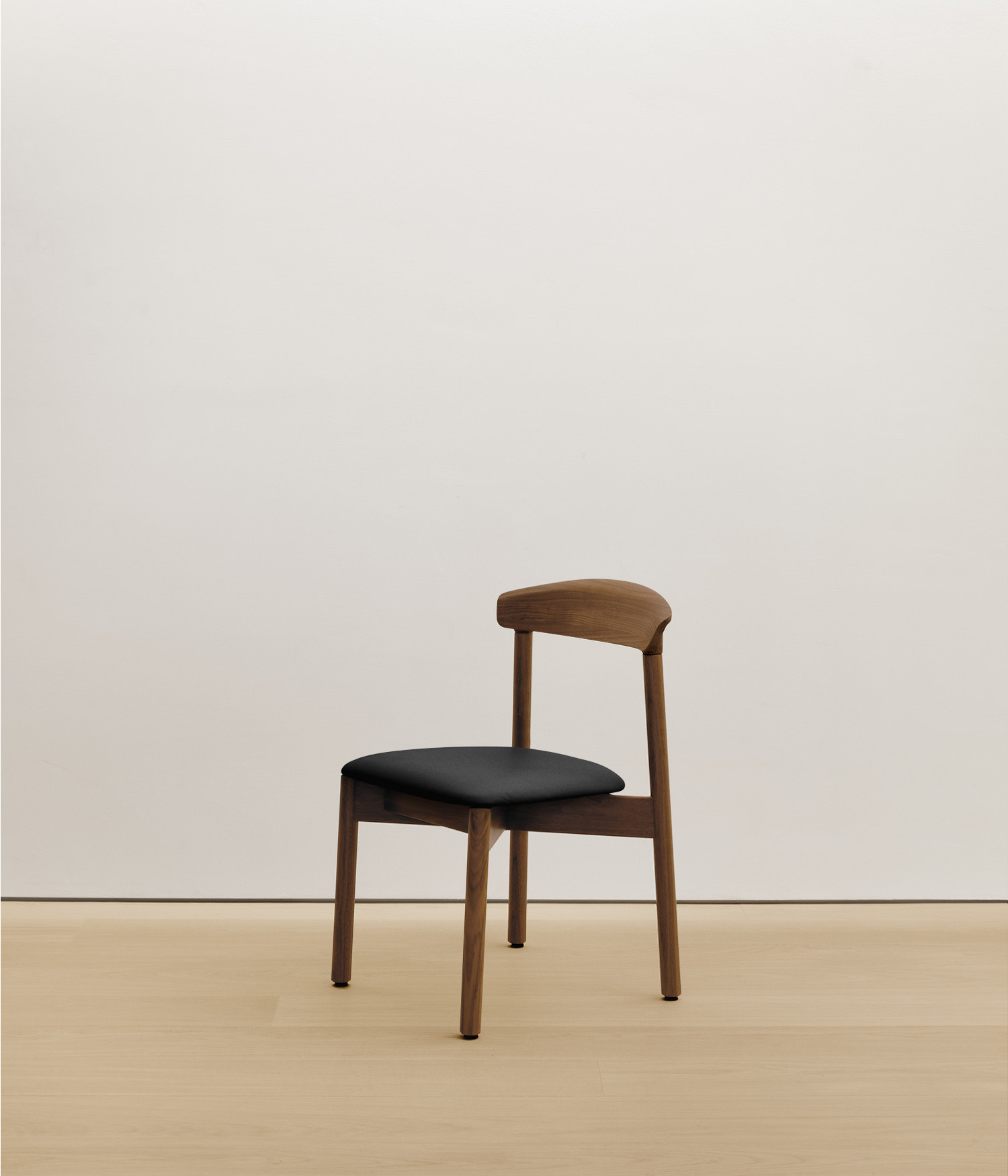  walnut chair with black color upholstered seat