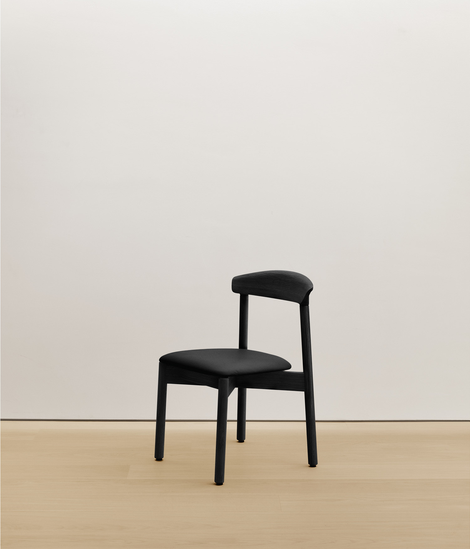  black-stained-oak chair with black color upholstered seat