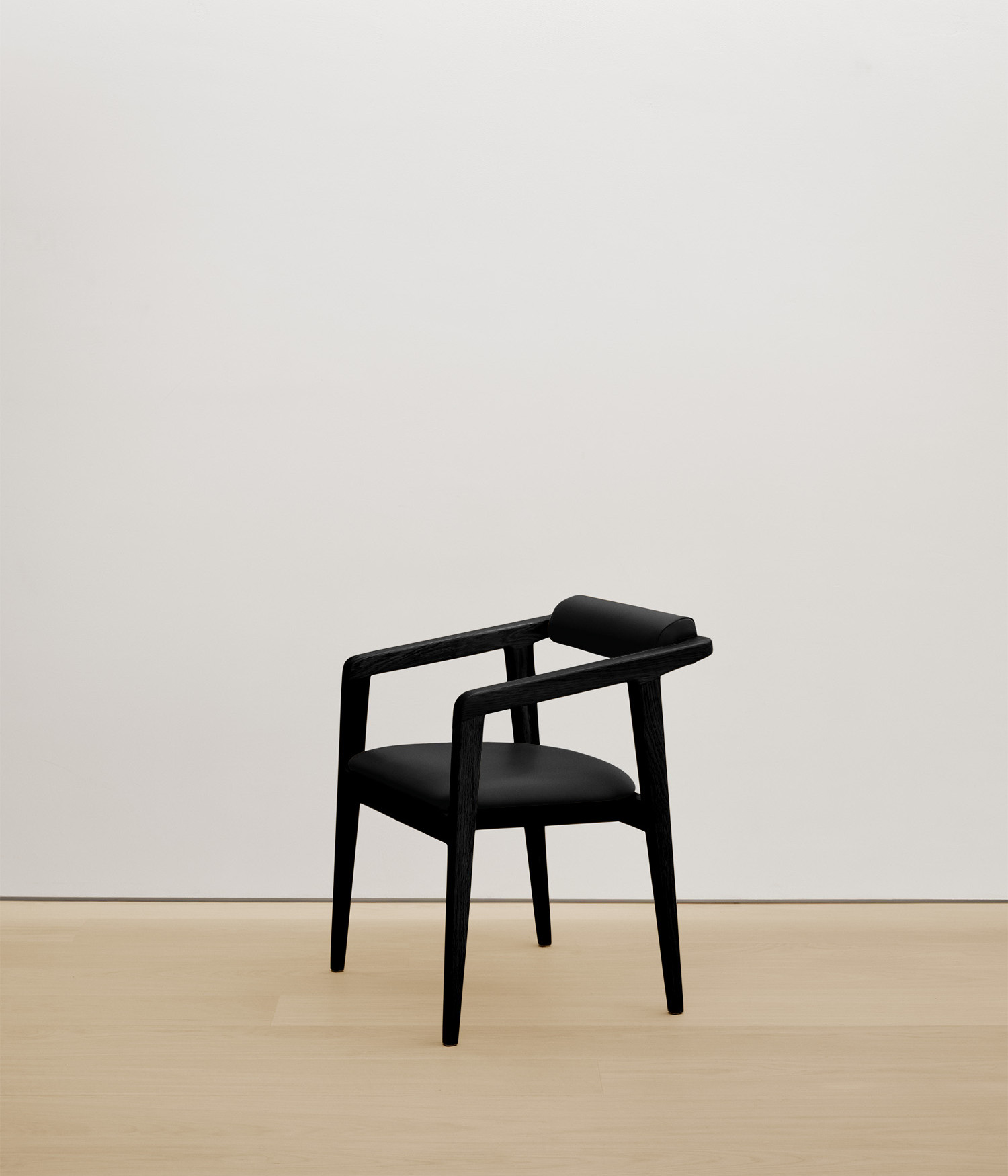  black-stained-oak chair with black color upholstered seat