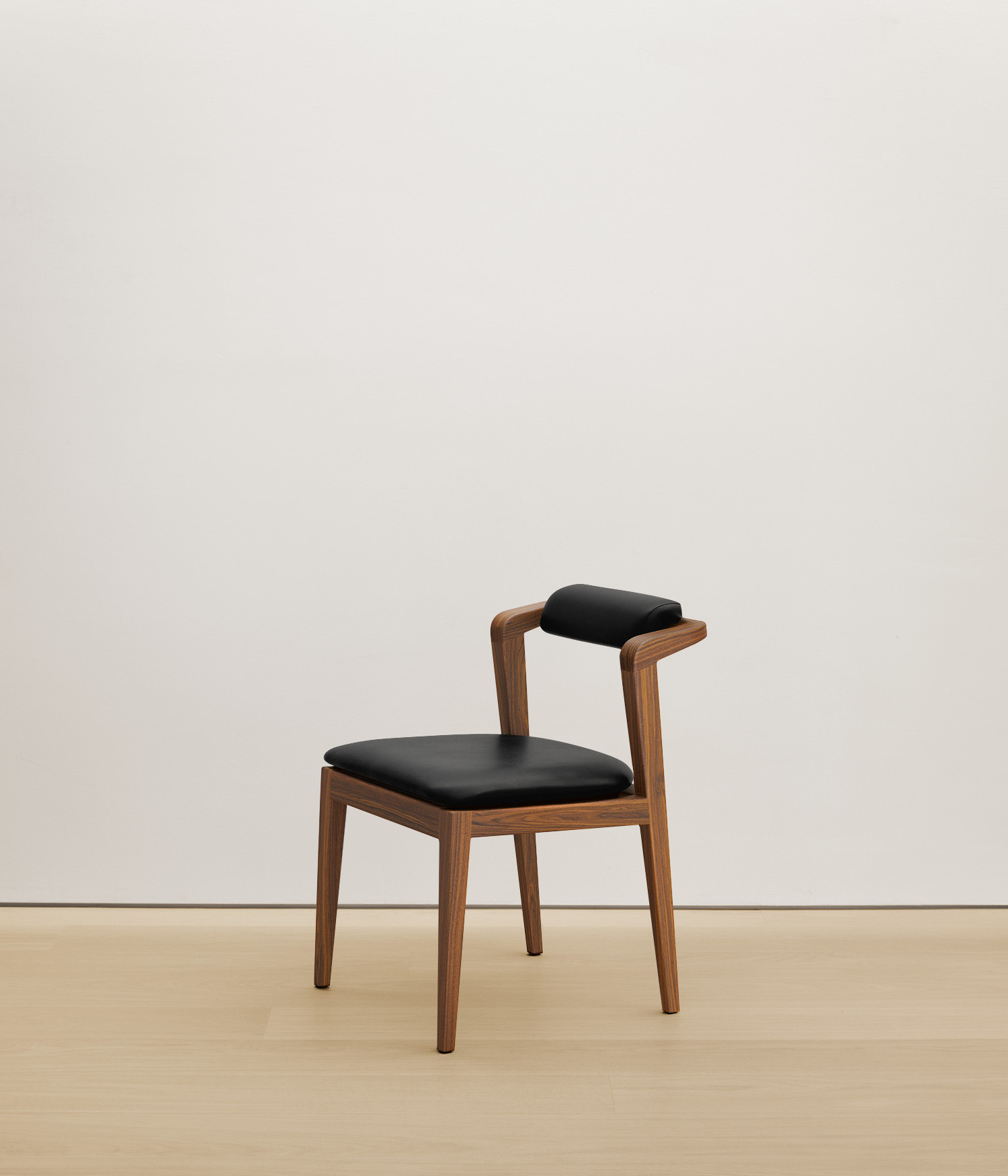  walnut chair with black color upholstered seat
