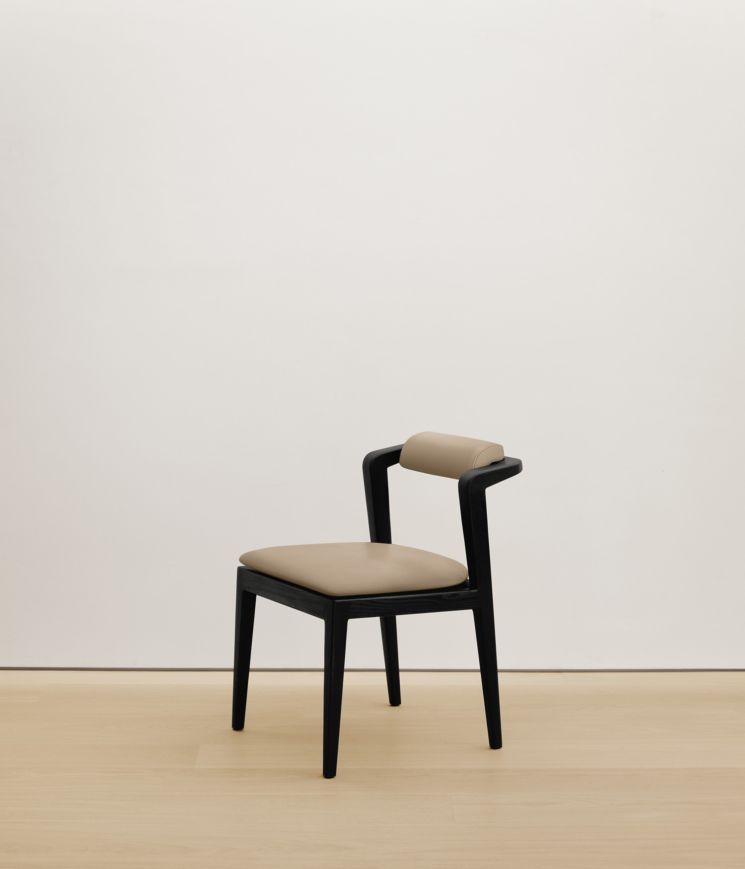  black-stained-oak chair with cream color upholstered seat 