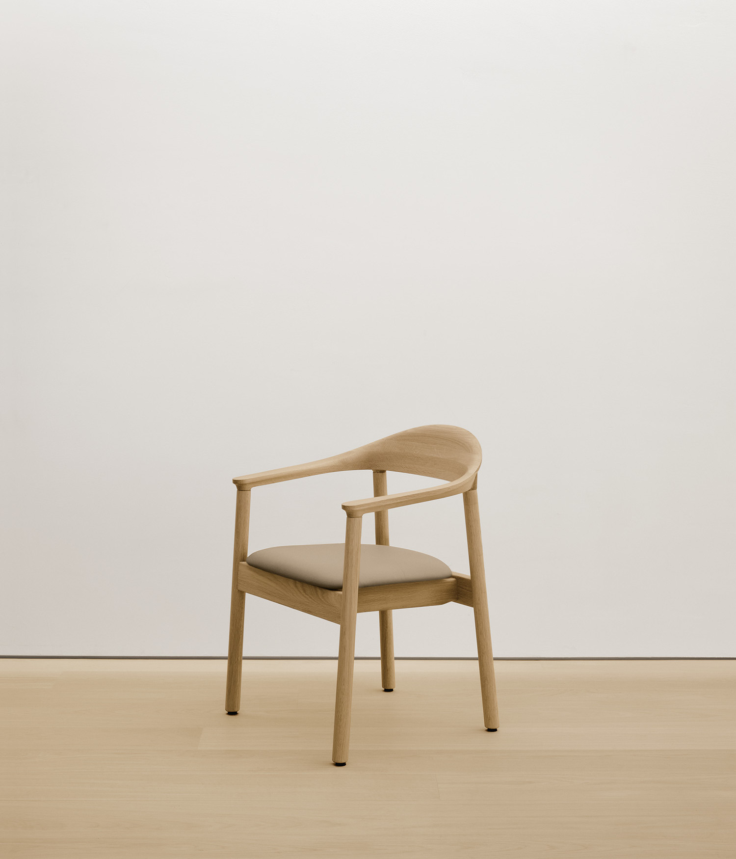white-oak chair with cream color upholstered seat 