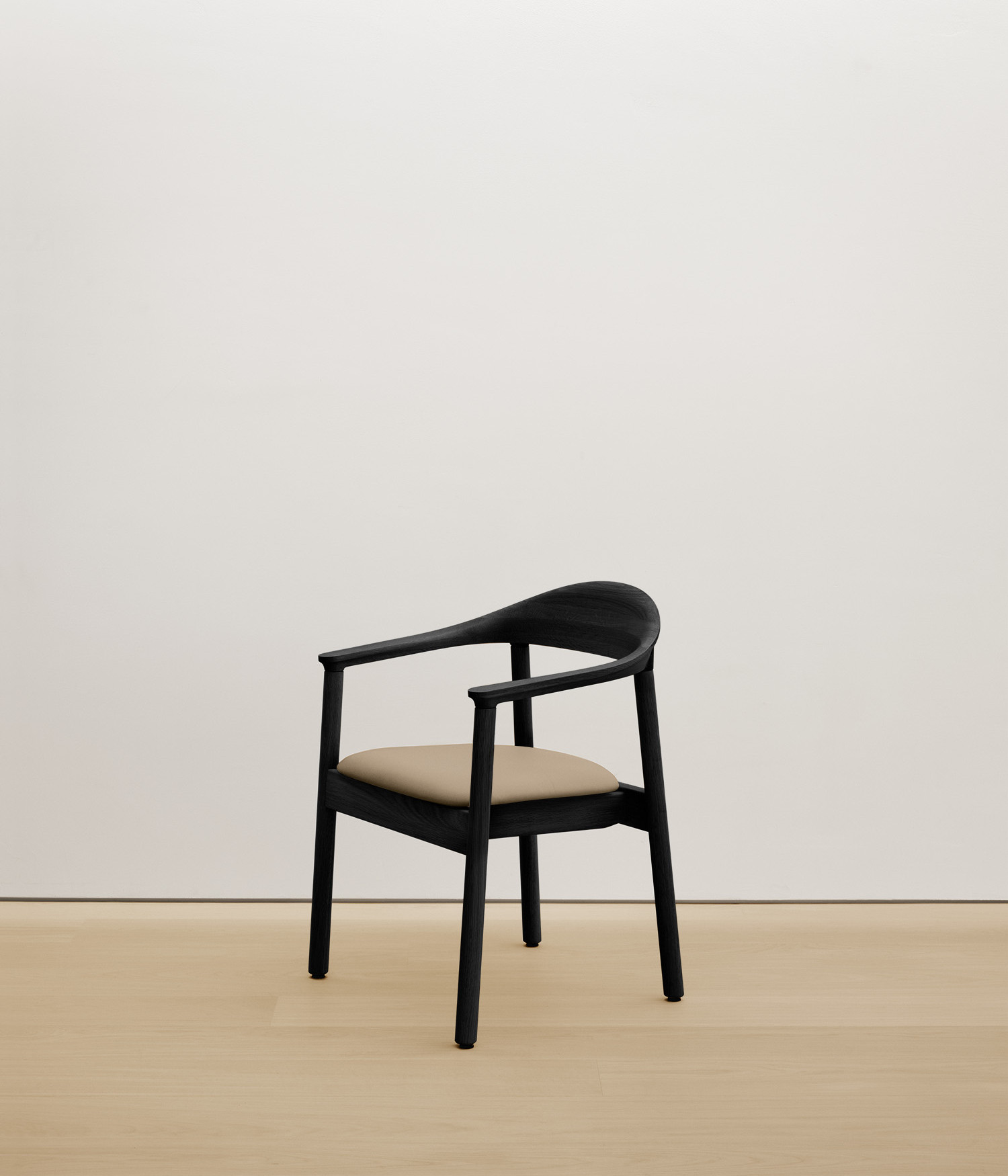 black-stained-oak chair with cream color upholstered seat 