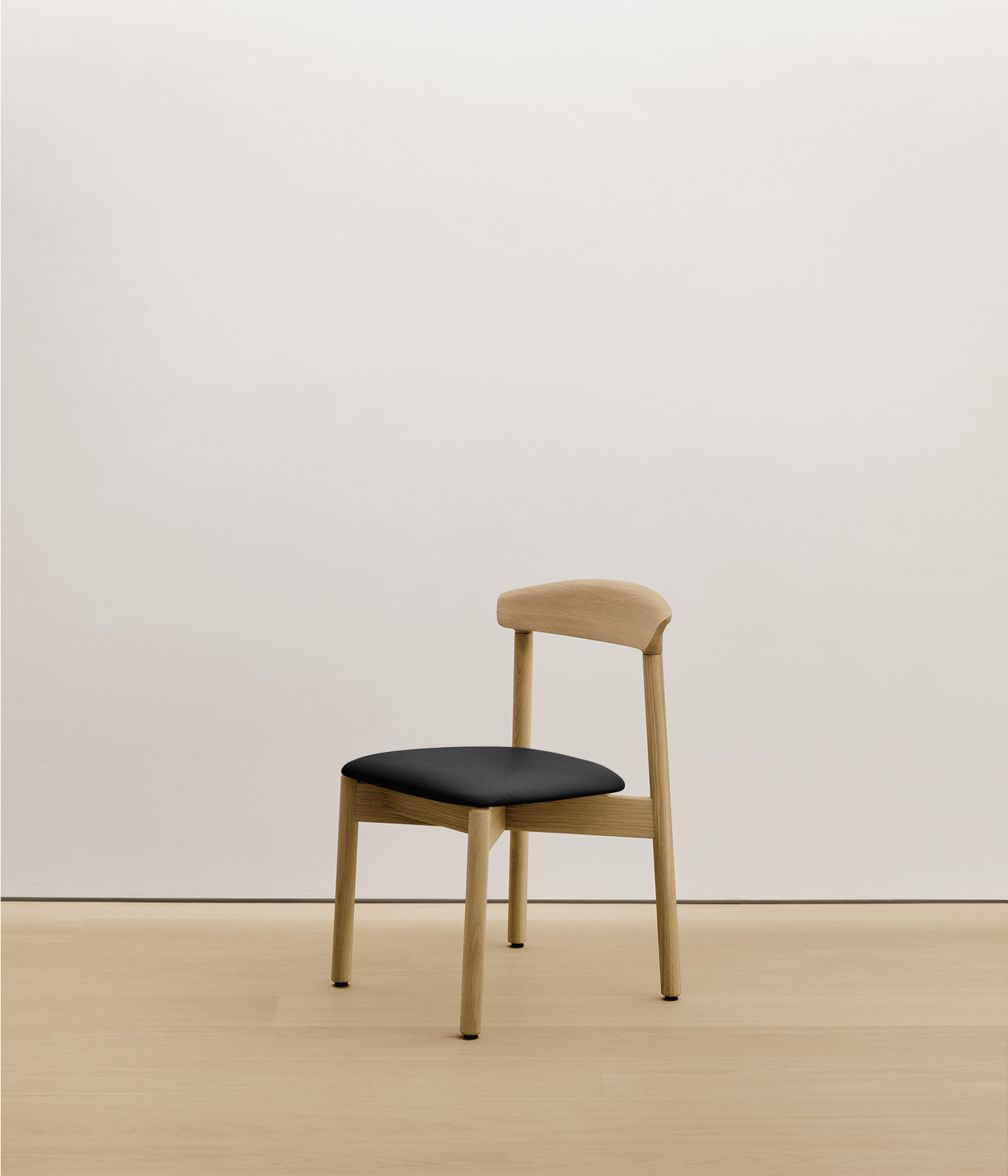  white-oak chair with black color upholstered seat
