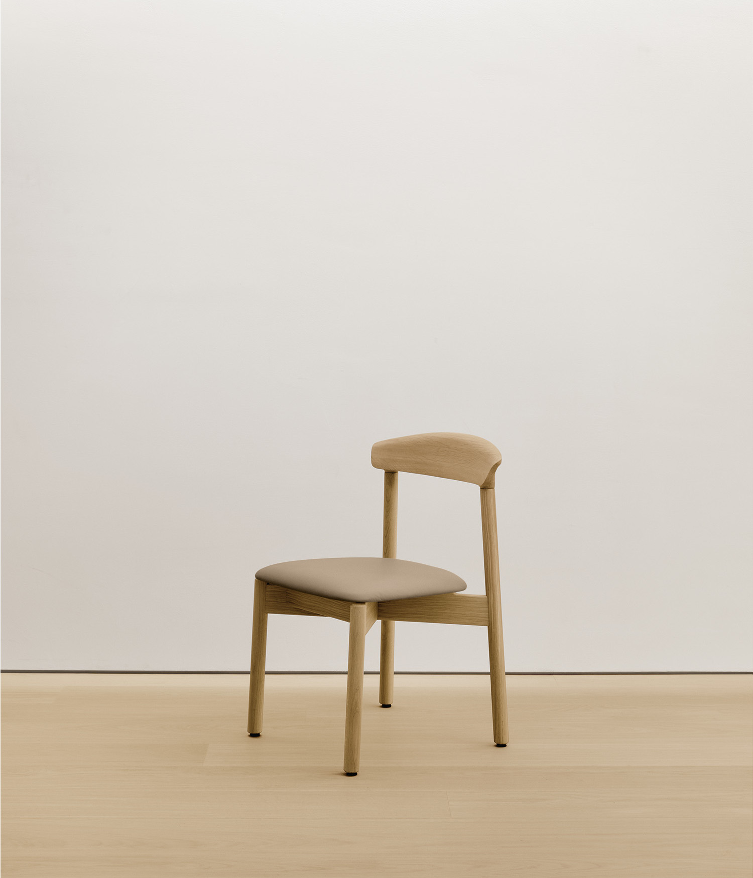  white-oak chair with cream color upholstered seat 