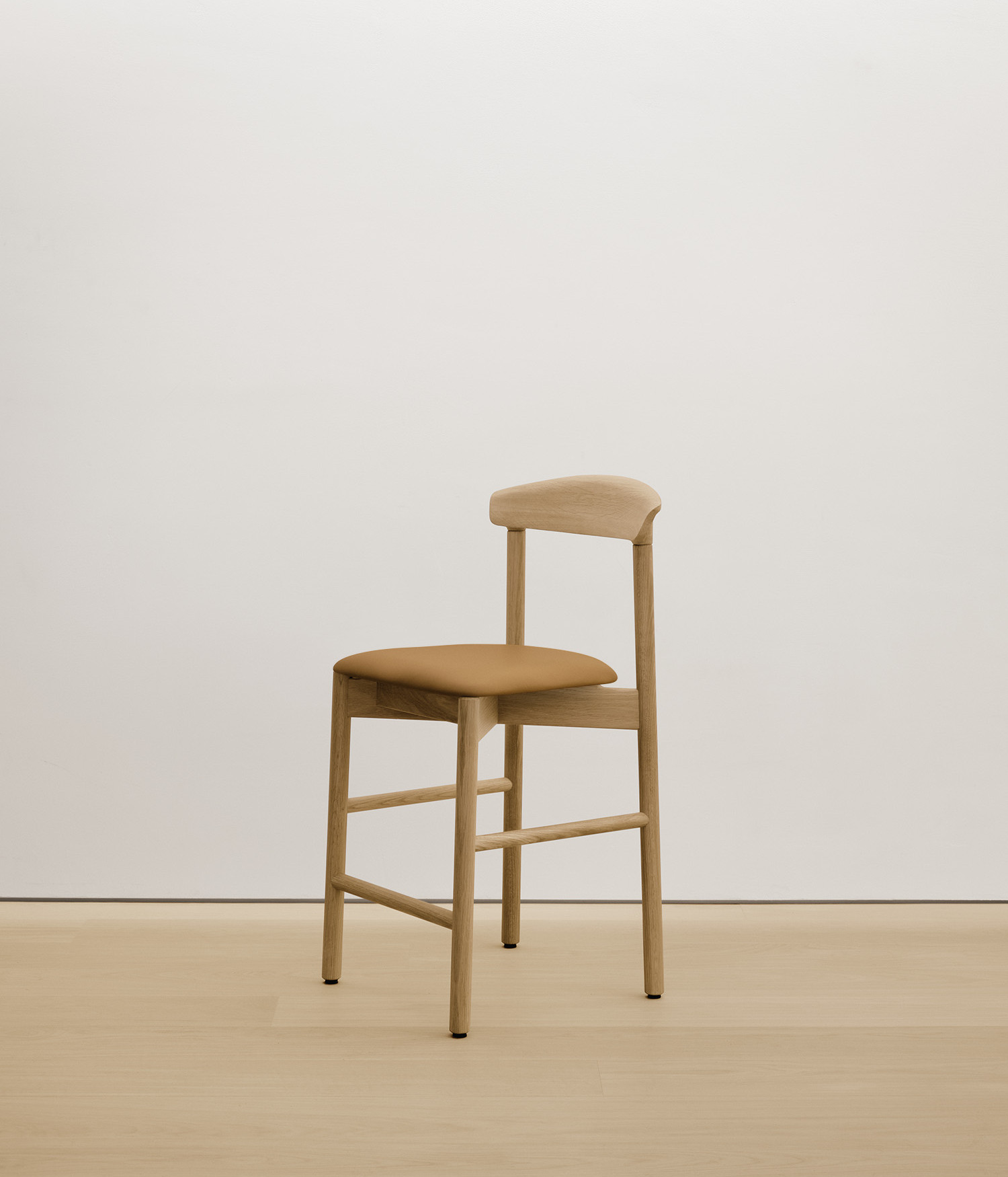  white-oak stool with tan color upholstered seat 