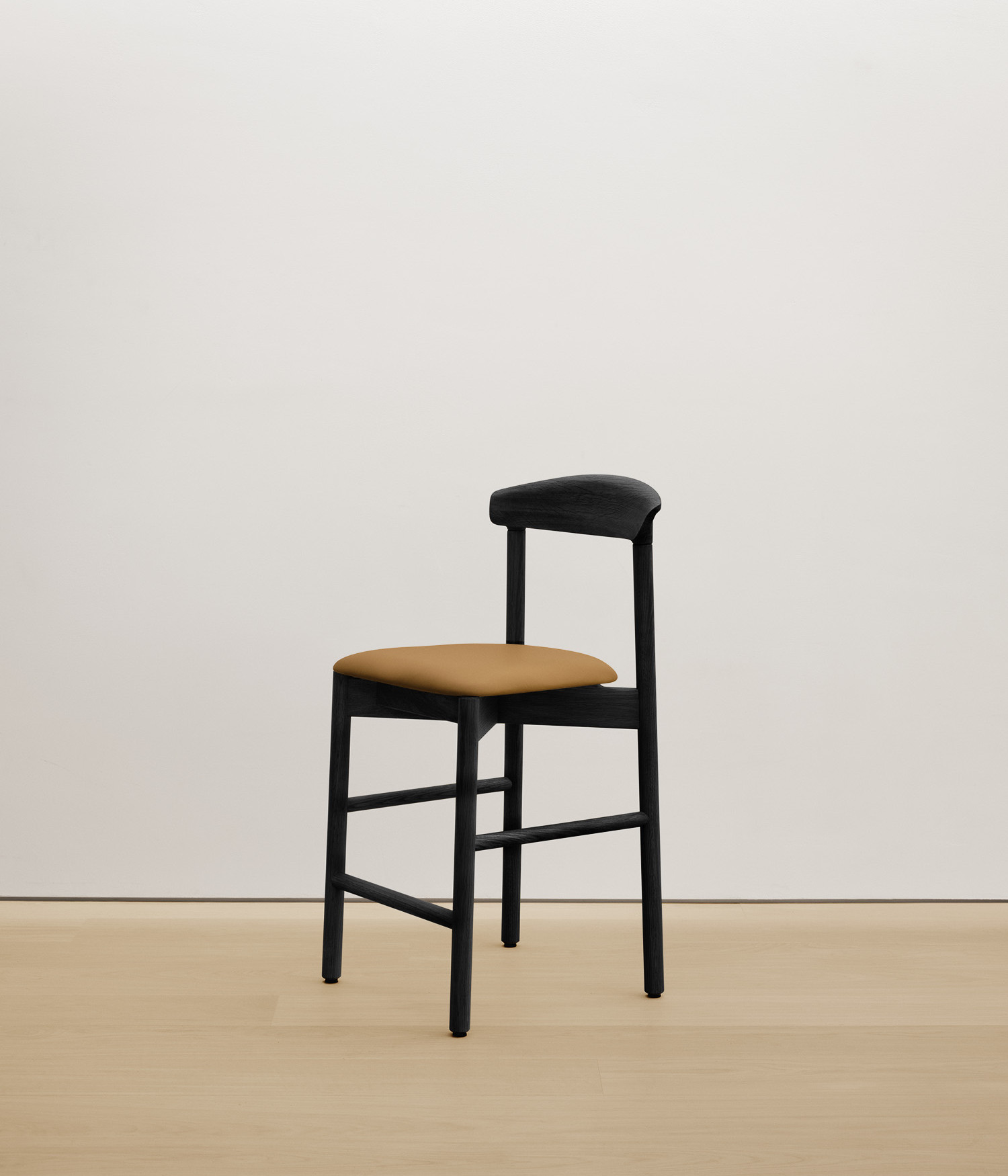  black-stained-oak stool with tan color upholstered seat 