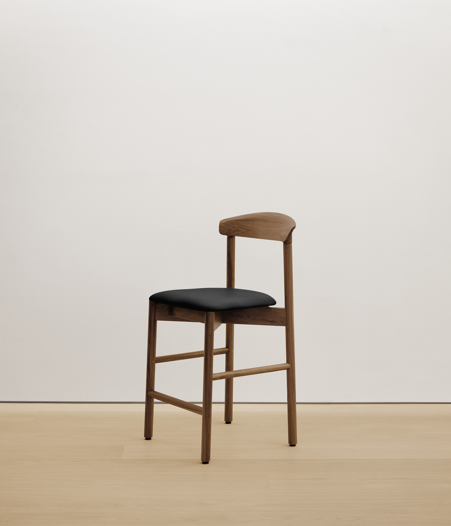  walnut stool with black color upholstered seat