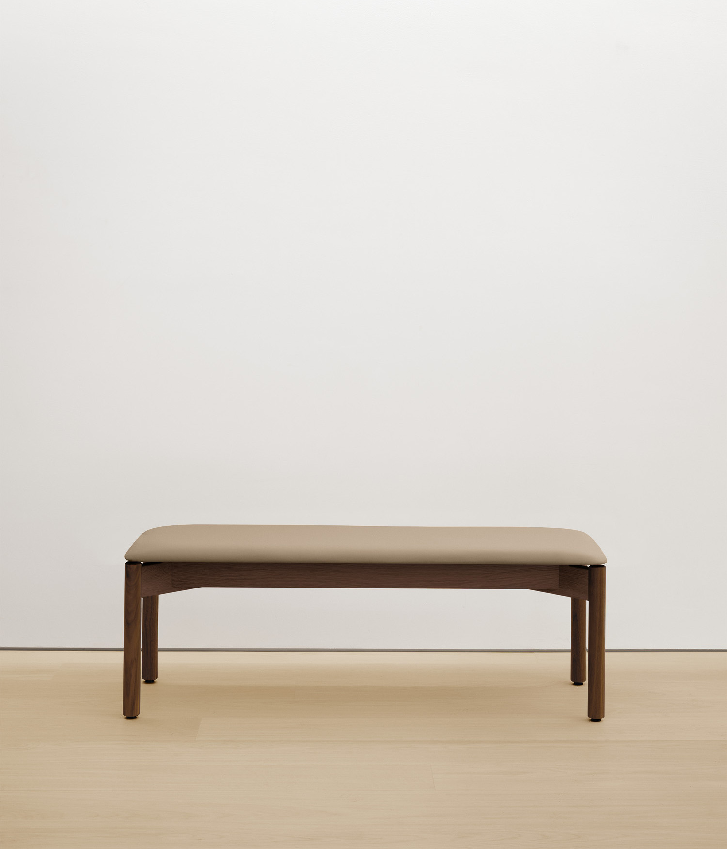 walnut bench with cream upholstered seat